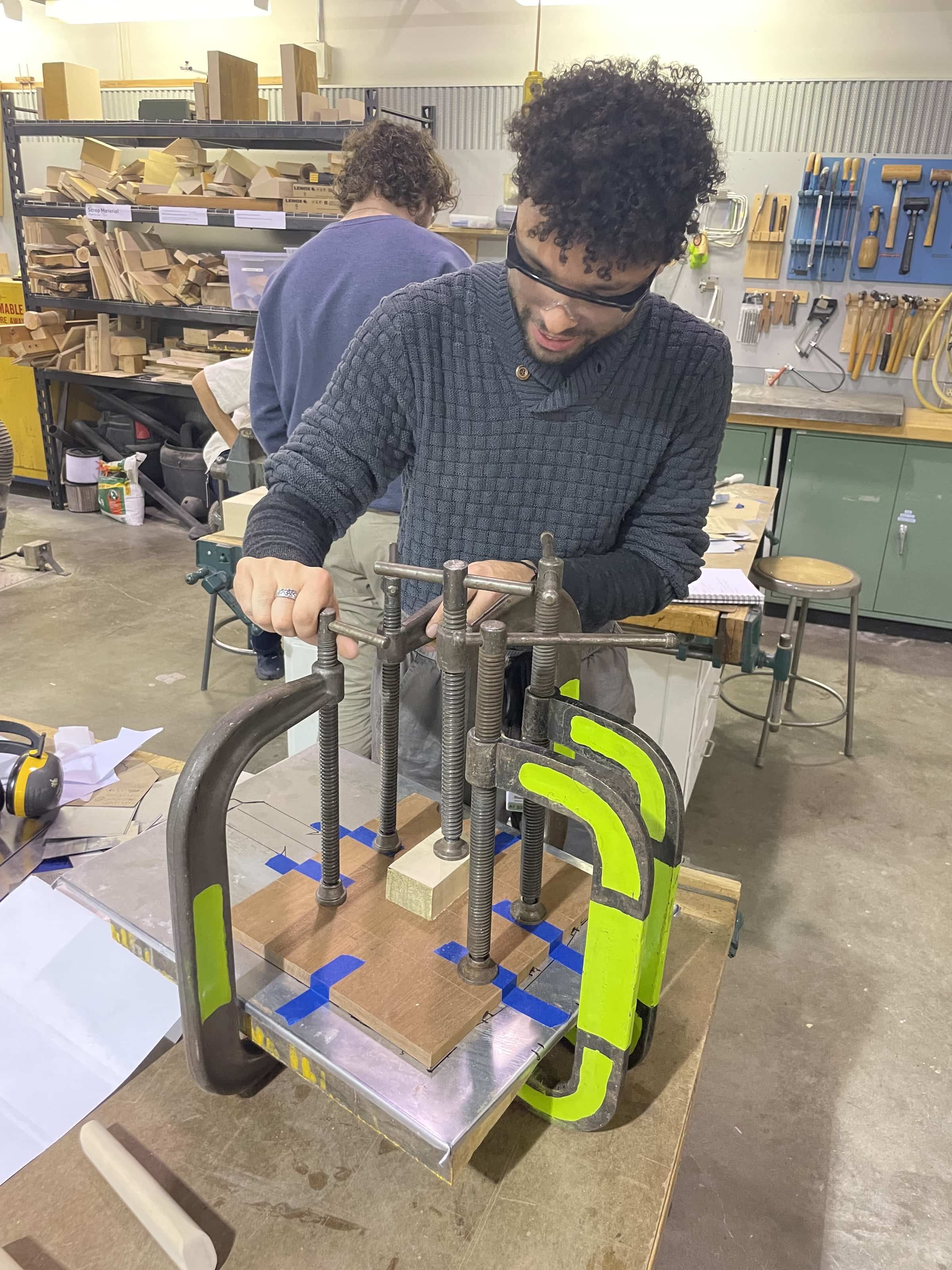 Pressing the metal with clamps