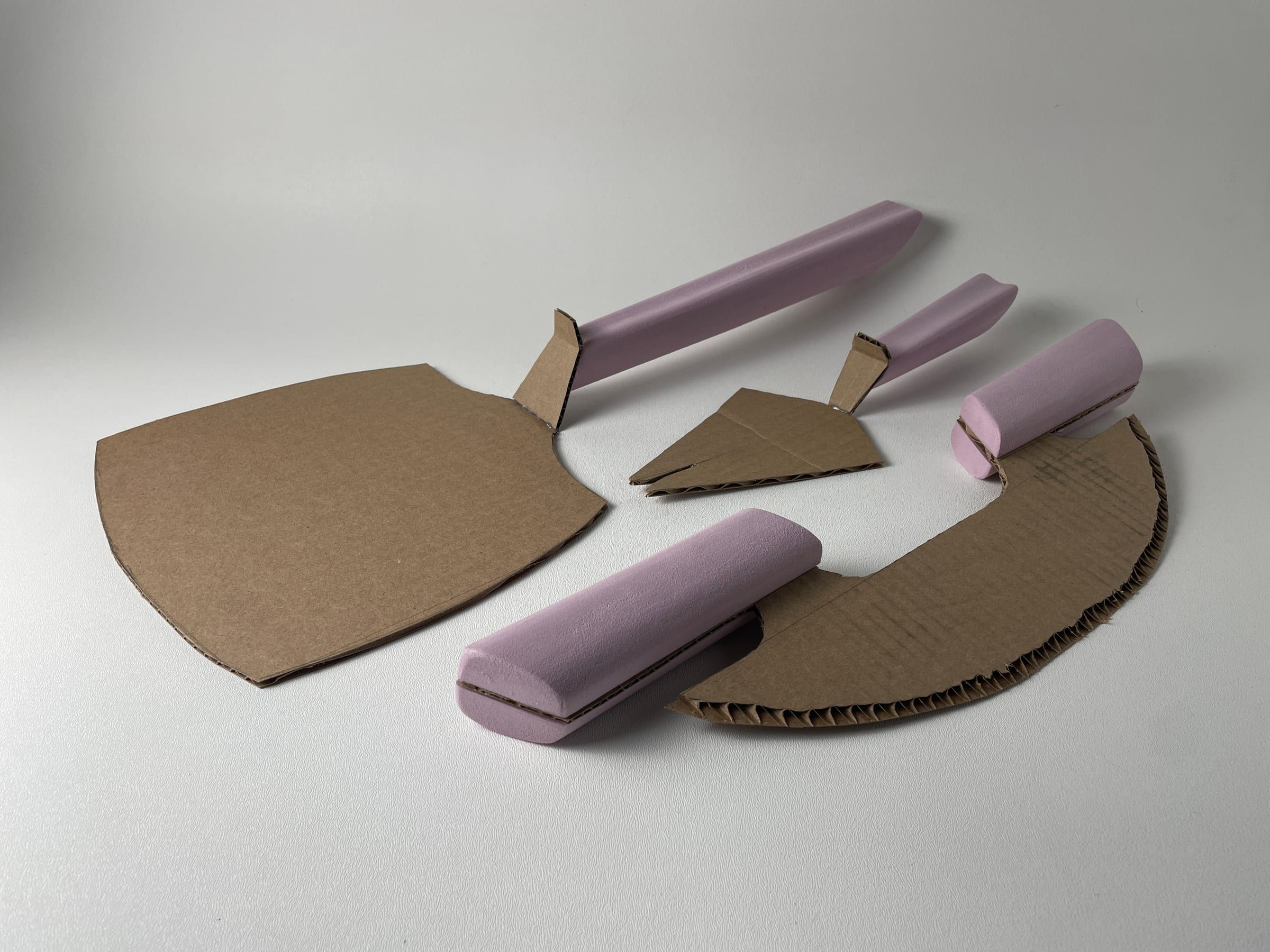 Cardboard and foam sketch models of the peel, server and cutter