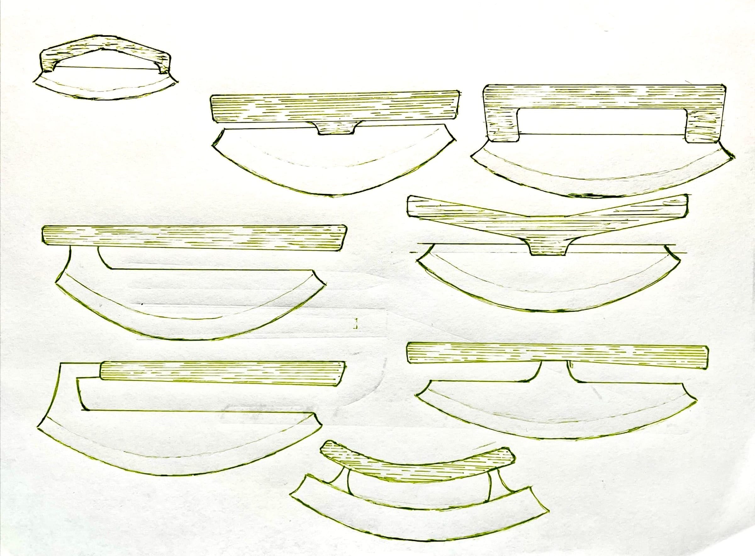 Sketches of rocking cutter blade and handle shapes